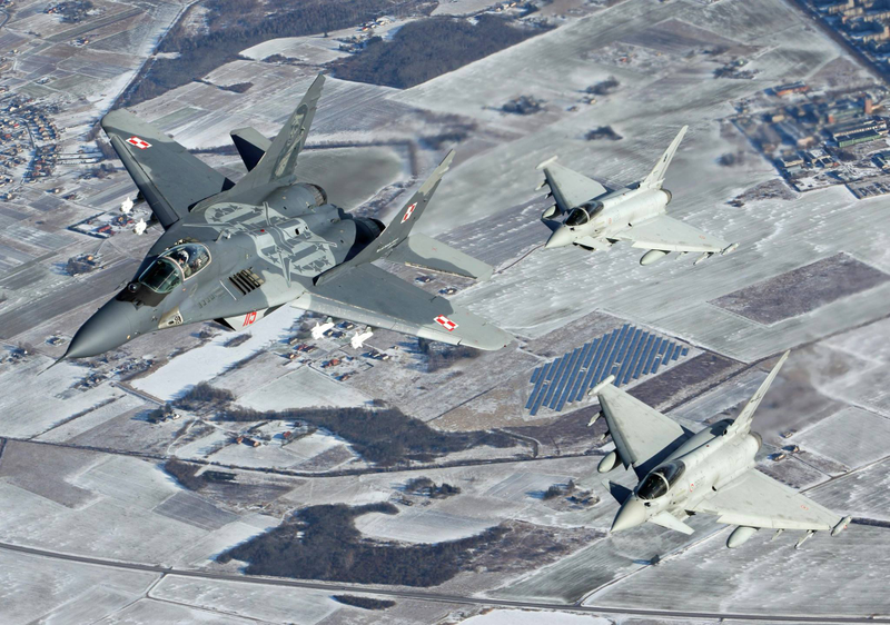 Illustration for article titled These Shots Of Fulcrums and Eurofighters Over Lithuania Are Amazing